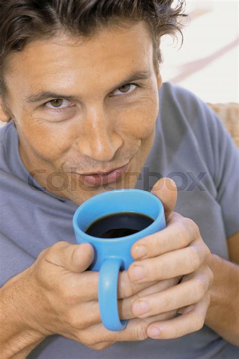 Man drinking coffee | Stock image | Colourbox