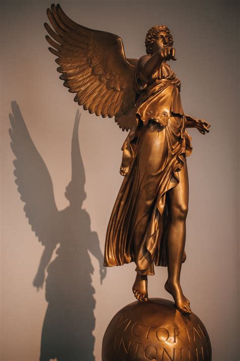 Ancient Statue Of Nike Goddess Made From Brass · Free Stock Photo