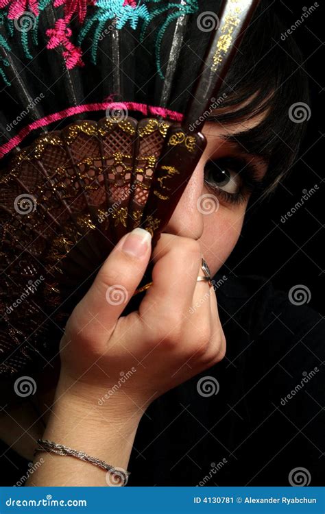 Girl with a spanish fan stock image. Image of sensuality - 4130781