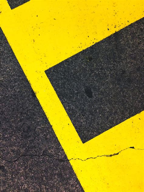 "Yellow Parking Lines Painted On The Asphalt" by Stocksy Contributor ...