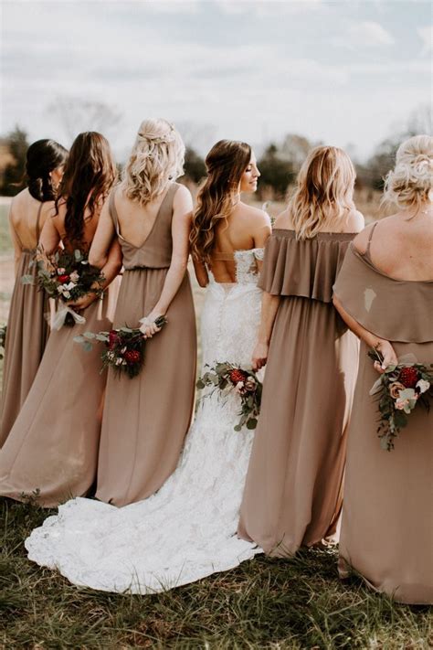 These neutral mismatched bridesmaids dresses added to the warm feel of this fall wedding | Image ...