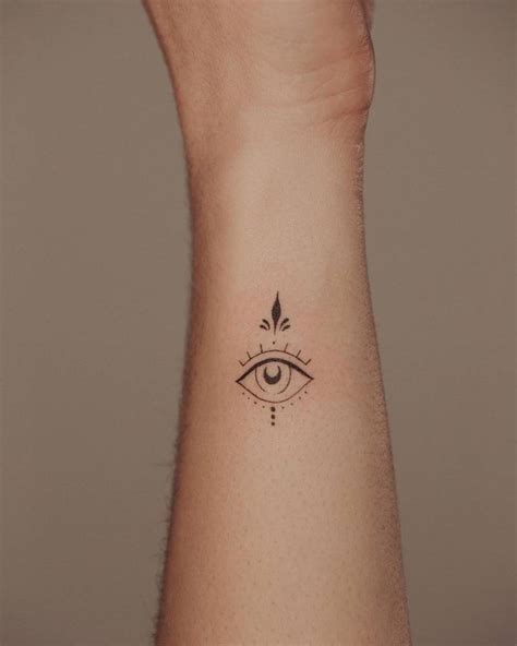 Discover 71+ evil eye wrist tattoo latest - in.cdgdbentre