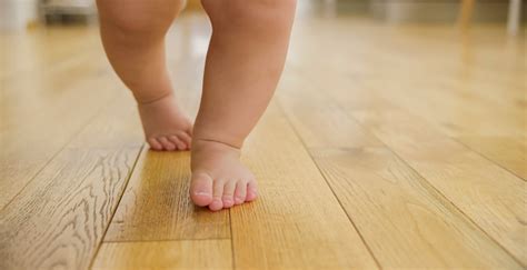 Baby Boy Taking First Steps Stock Photo - Download Image Now - iStock