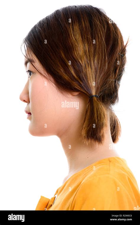 Profile view of face of young beautiful Asian woman Stock Photo - Alamy