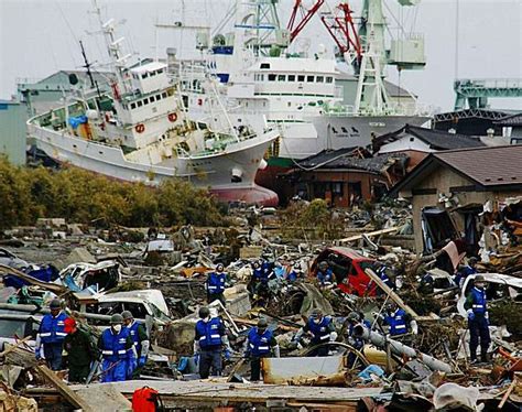 Japan's death toll climbs as bodies wash up