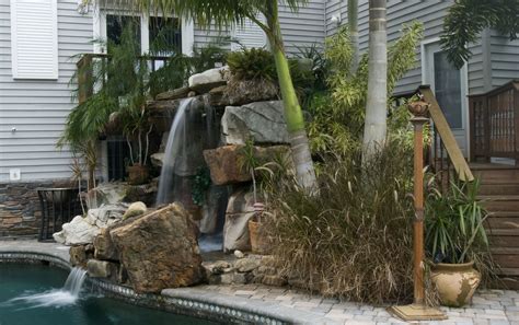 Tall Grotto Waterfall Lagoon Pool Remodel