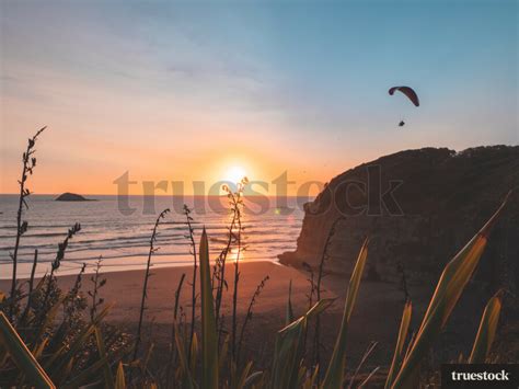 Auckland Beach Sunset by Chris Street - Truestock