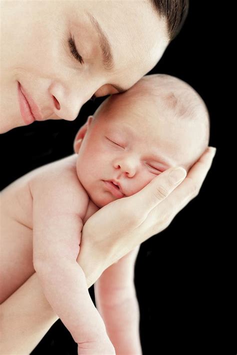 Mother Holding Newborn Baby Photograph by Ian Hooton/science Photo Library