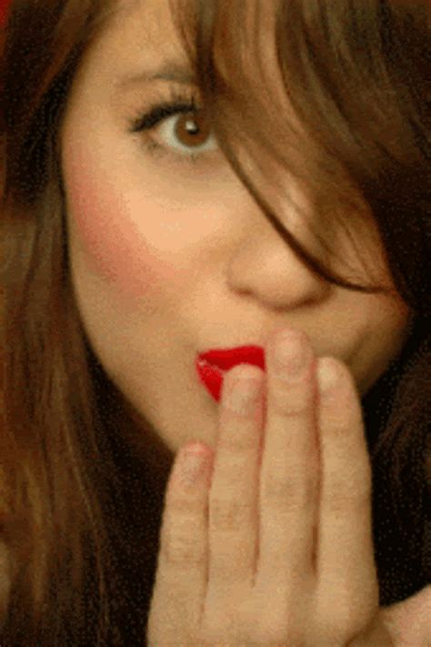 Girl With Red Lipstick Flying Kiss GIF | GIFDB.com