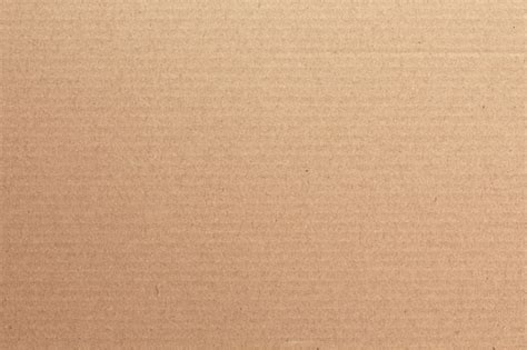 Premium Photo | Brown cardboard sheet abstract background