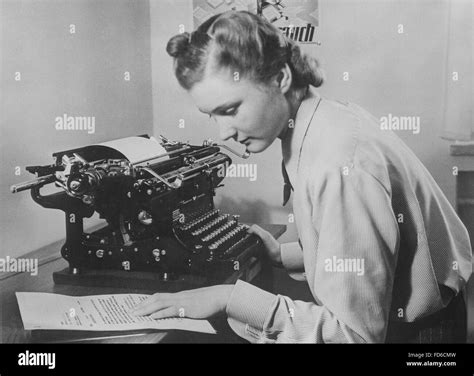 Secretary with typewriter, before 1945 Stock Photo - Alamy