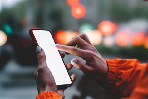 Close,Up,View,Of,Female,Hands,Holding,Mobile,Phone,Touching - #BHtheChange