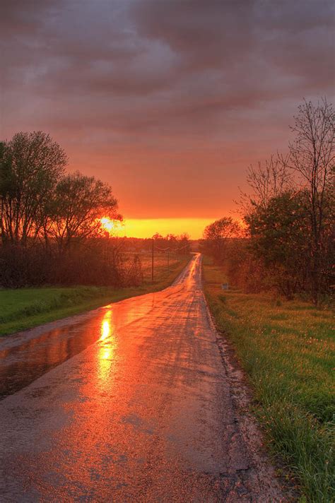 Orange Sunset Glow On Wet Country Roads Photograph by Matt Champlin ...