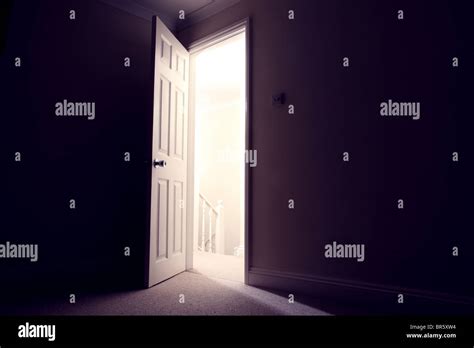 Dark room with open door light streaming in Stock Photo: 31478304 - Alamy