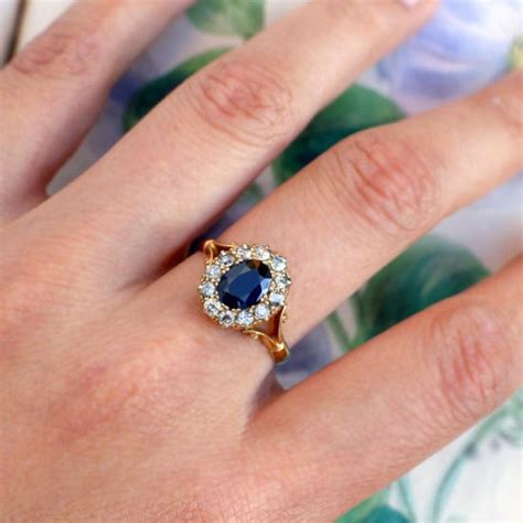 1911 Antique Sapphire Ring with Diamond Halo — Heart of Hearts Jewels