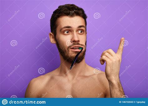 Funny Guy with Toothbrush in the Mouth Pointing Up Stock Image - Image of face, medical: 146732043