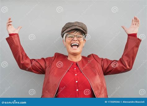 Happy Senior Woman Dancing and Laughing Outdoor - Trendy Mature Person Having Fun during Retired ...