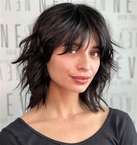 How to Rock the Trendy Wolf Cut Hair with Bangs: Styling Tips and ...