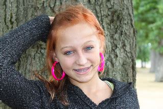 Female Teenager | Teenager and her wild pink earrings. | Jenn Durfey | Flickr