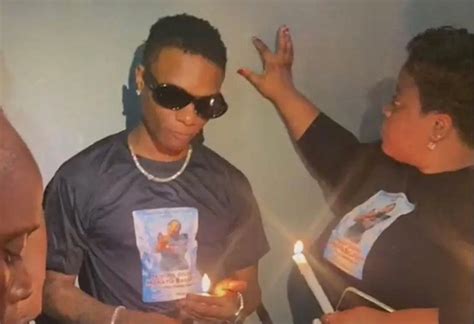 VIDEO: Grief-stricken Wizkid joins siblings at candlelight vigil for mum