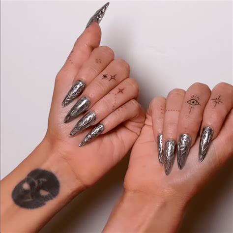 Megan Fox Just Debuted Dainty Finger Tattoos and a Spiderweb Chrome ...