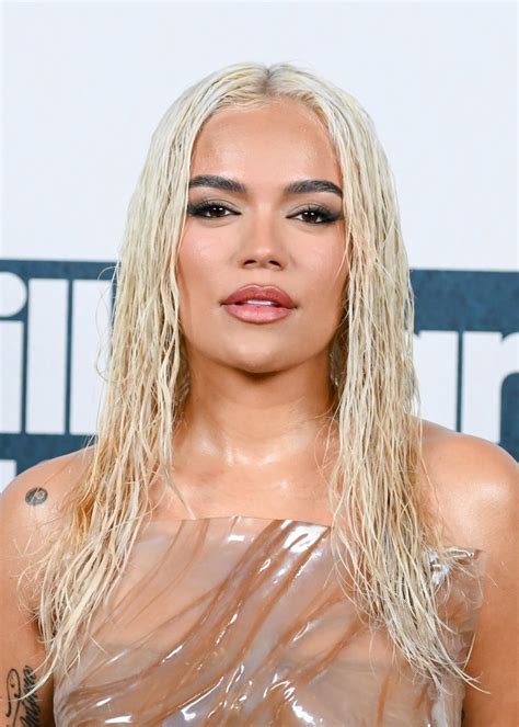 Karol G Wears Wet Look Dress on Billboard Music Awards 2023 Red Carpet