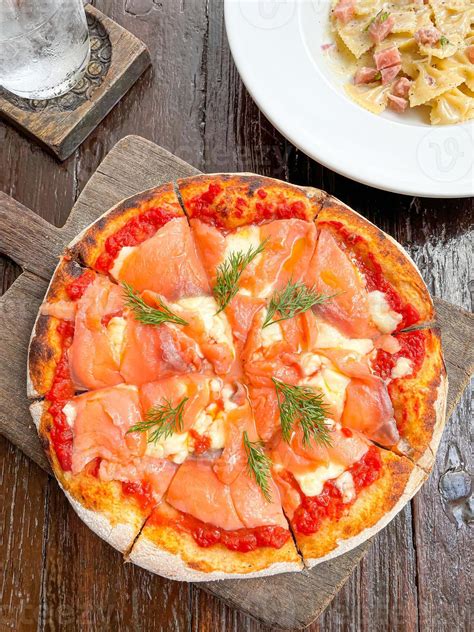 smoked salmon pizza on tray 6238629 Stock Photo at Vecteezy