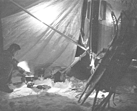 Free picture: man, bending, cook, stove, outside, plane, night, tarp, protection