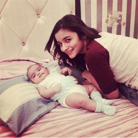 Alia Bhatt cute picture with a new born baby - Photo | Picture | Pic © BoxOfficeMovies.in