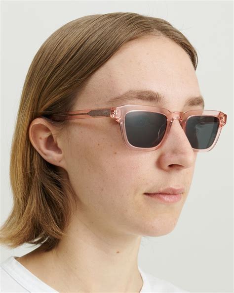 Transparent, thinner square frame in a tone of pink, handmade of Italian acetate. Black Carl ...