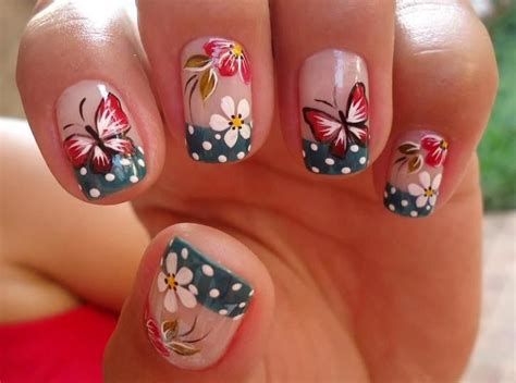 Dark blue white polka dot French manicure tips with butterflies and ...