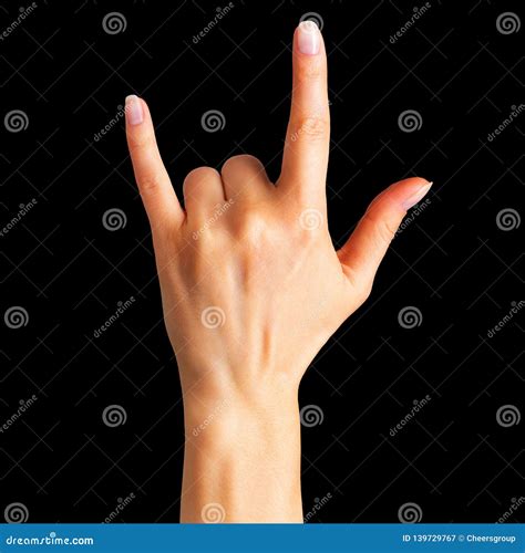 Female Hand Showing Rock N Roll Sign or Giving the Devil Horns Gesture ...