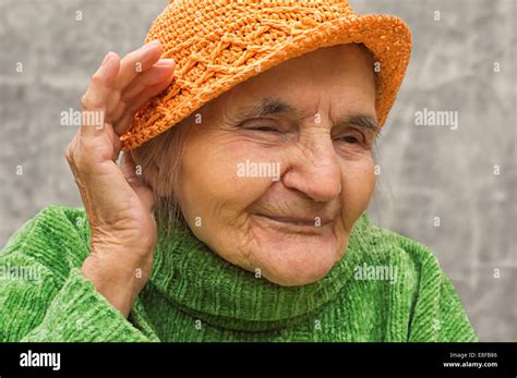 Elderly woman hand head hi-res stock photography and images - Alamy