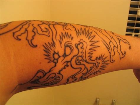 Colourless spiny, evil monster,sharp claws, forearm tattoo - Tattooimages.biz