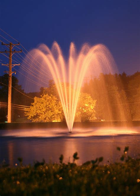 AquaMaster® Fountains - Masters Series. Medinah - Tall multi-streamed arch pattern. Straightened ...