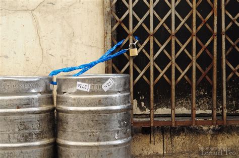 Beer kegs chained to sliding gate | I struggle to decide whi… | Flickr