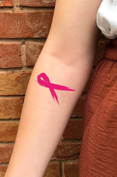 Breast Cancer Ribbon Tattoo Behind Ear: Show Your Support with a Bold Statement!