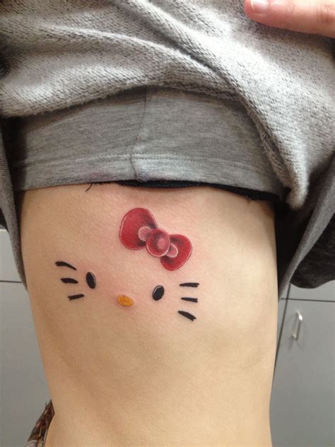 cute hello kitty tattoo (: | Hello kitty tattoos, Tattoos for guys, Tattoos