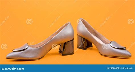 Leather Beige Shoes on Yellow Background, New Pair Stock Image - Image of female, shoe: 283889829