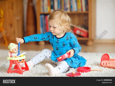 Adorable Cute Little Image & Photo (Free Trial) | Bigstock