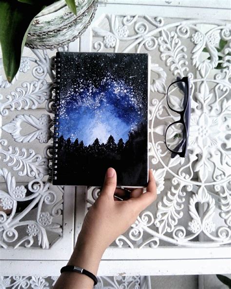 DIY Notebook cover of a starry blue night sky over the dark woods ...