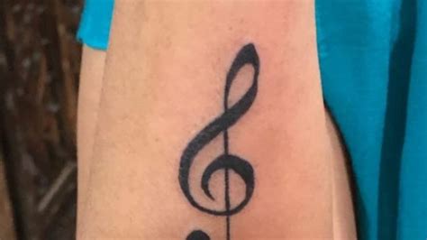 Top 100+ Music notes tattoo hand - Monersathe.com