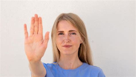 Close-up Stop Sign Showing by Smiling Young Woman Stock Photo - Image ...