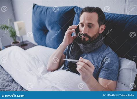 Sick Man Holding Thermometer Stock Image - Image of calling, people: 119164945