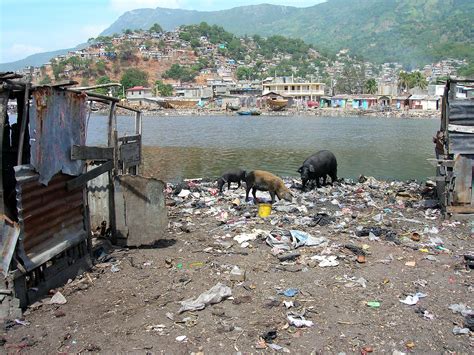 File:Waste dumping in a slum of Cap-Haitien.jpg - Wikimedia Commons