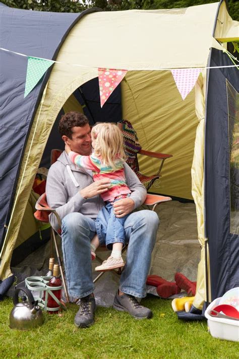 Father And Daughter Enjoying Camping Holiday On Campsite Stock Photo - Image: 49471118