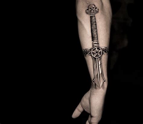 Sword tattoo by Niki Norberg | Photo 26498