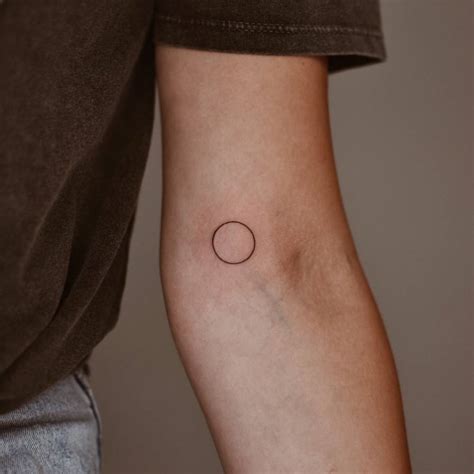 Two Circle Around Arm Tattoo Meaning - Best Design Idea