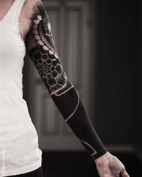 blackout tattoos | Solid black tattoo, Black sleeve tattoo, Black tattoos