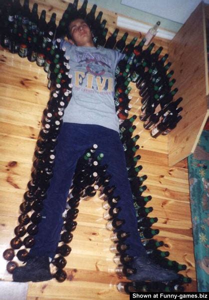 Drunk Guy - Funny pictures of people boy surrounded with beer bottles